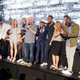 Showrunner Eric Kripke (center) surrounded by the cast of The Boys.